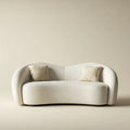 Kremowa sofa dwuosobowa z tapicerką bouclé 170 x 85 x 75 cm